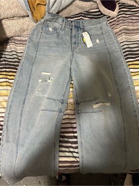 High-Rise Light Blue Wide-Leg Distressed Jeans